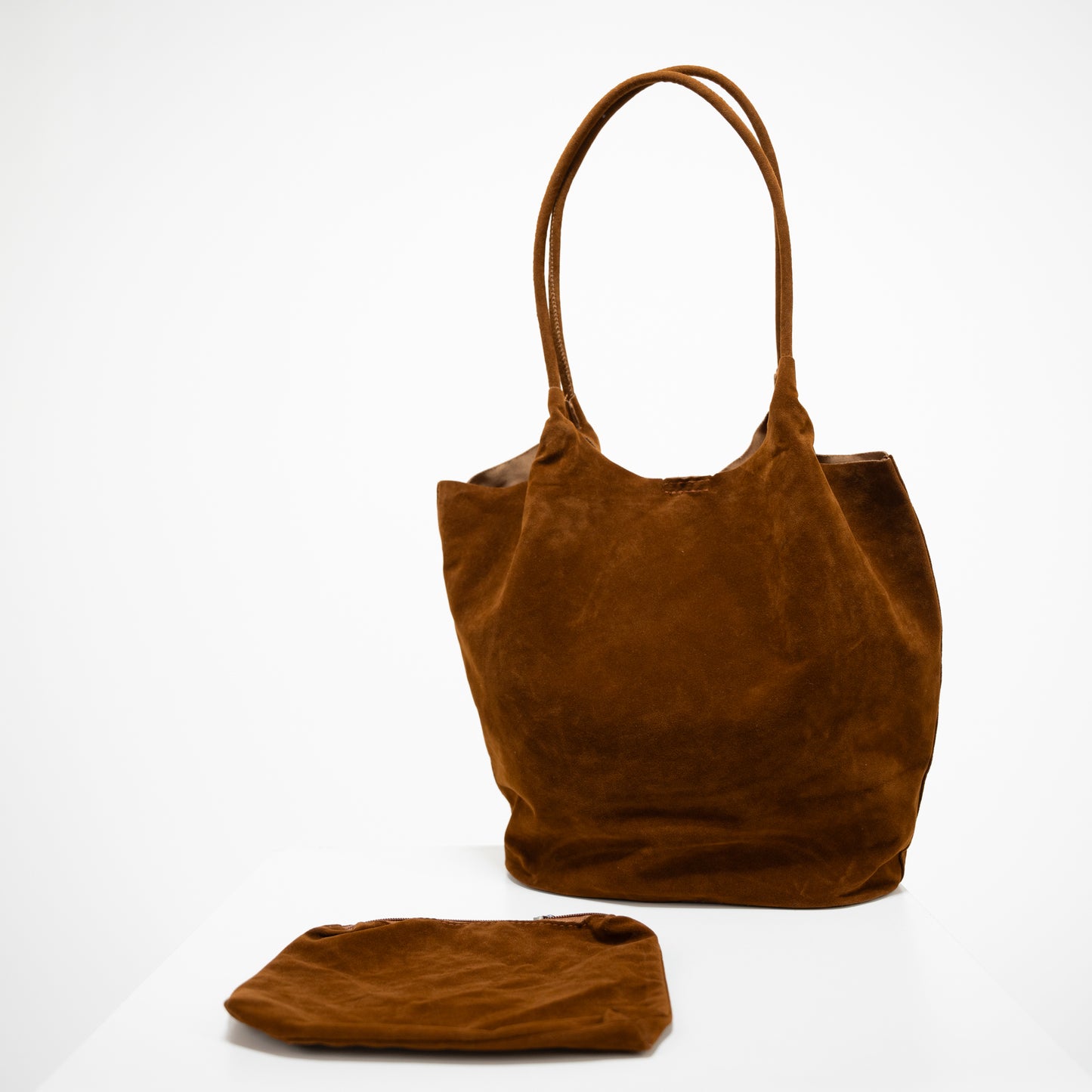 brown suede tote bag and black suede coin purse