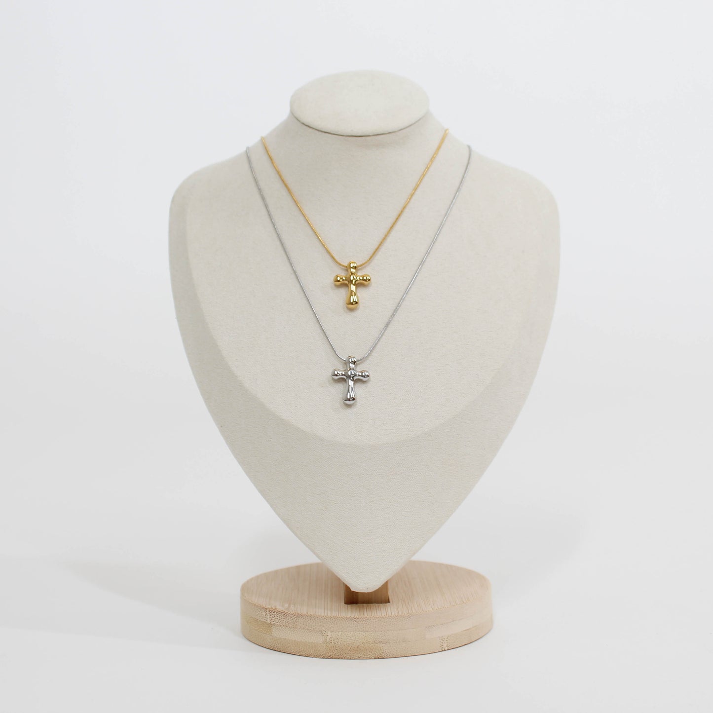 gold and silver cross necklace