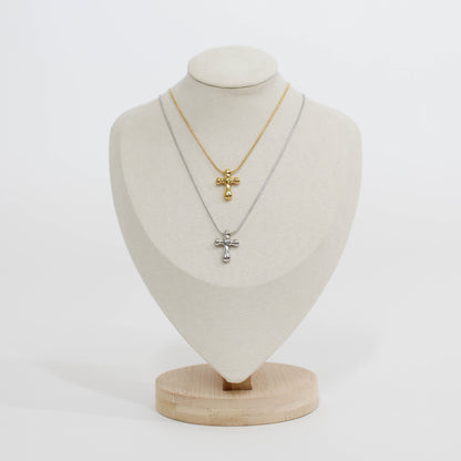 gold and silver cross necklace