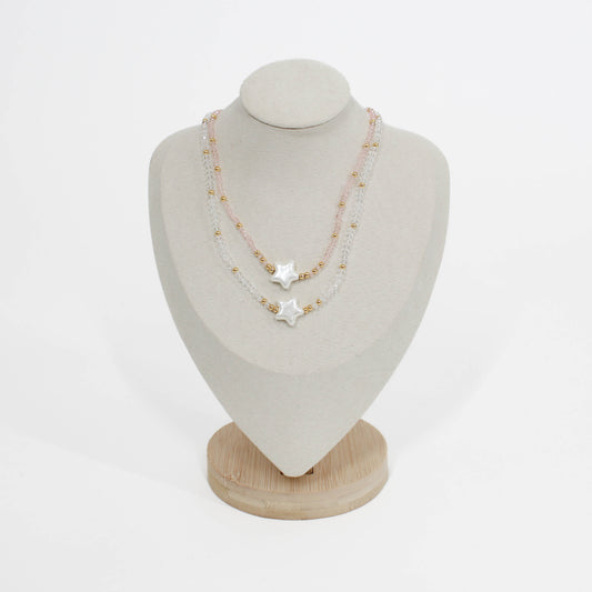 Necklace with star-shaped pendant bubble star choker on a mannequin bust against a white background