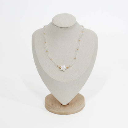 bubble star choker Necklace with a star pendant on a mannequin bust against a white background