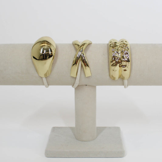 tan hair ties with gold details